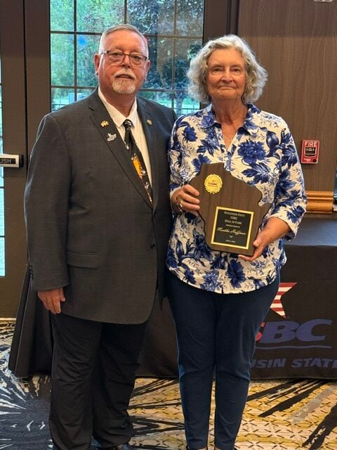 Inductee Martha Hoffman with President Doug Sleaford