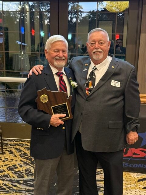 Inductee Roger Dalkin with President Doug Sleaford